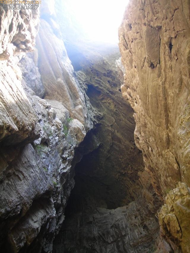 �������~