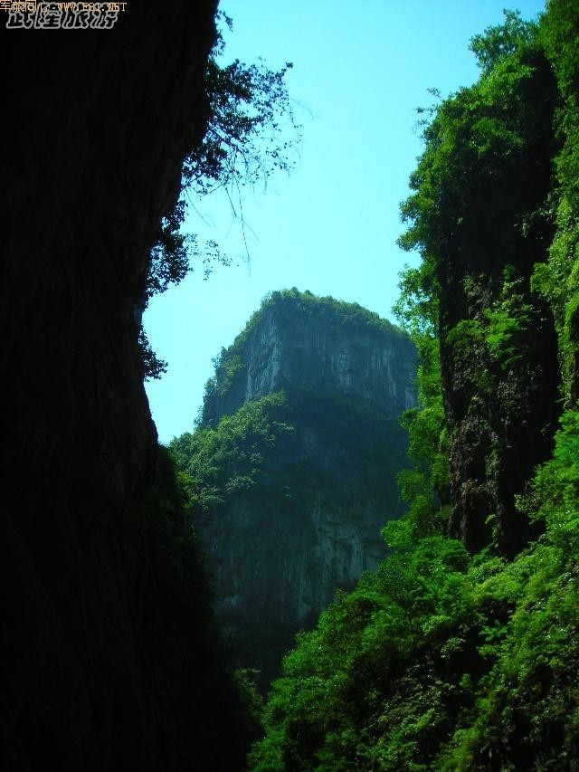 �������~